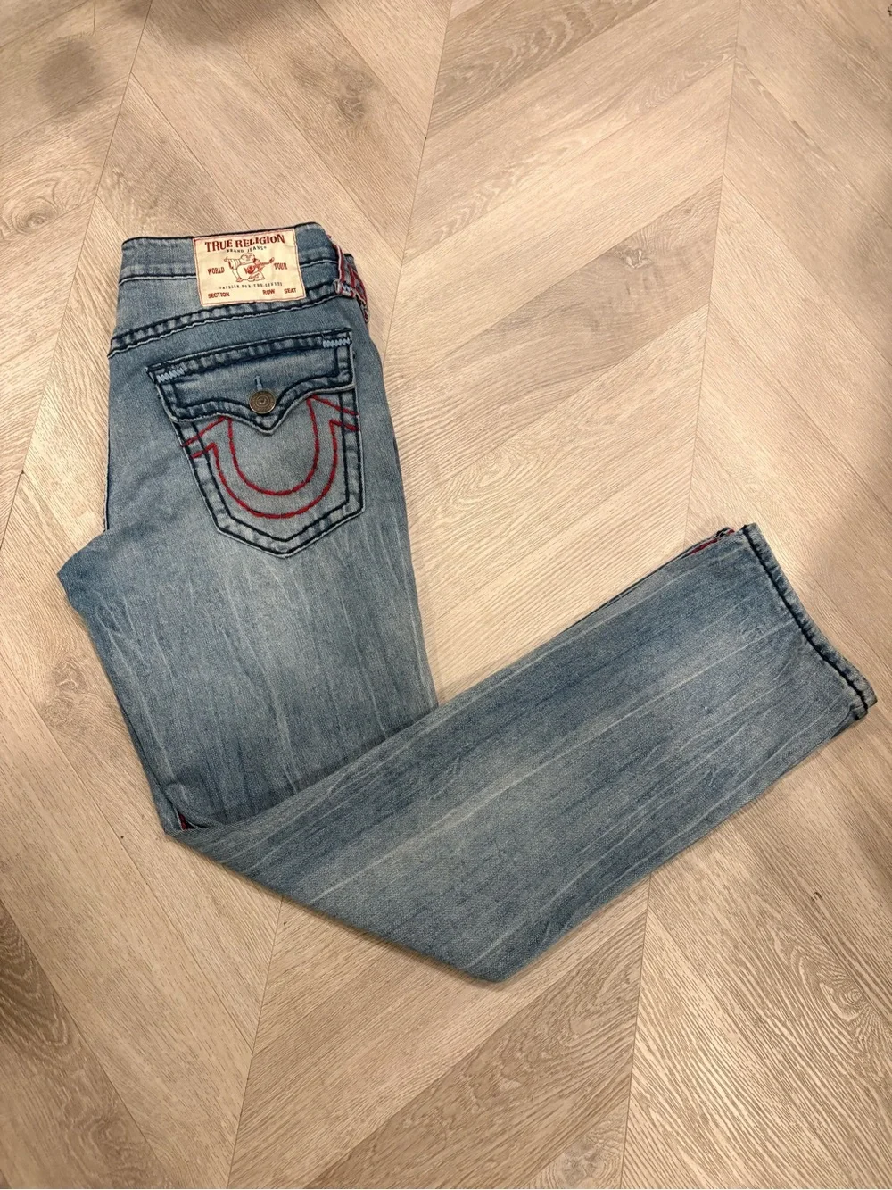 True Religion Light Wash Denim Jeans with Red Stitching